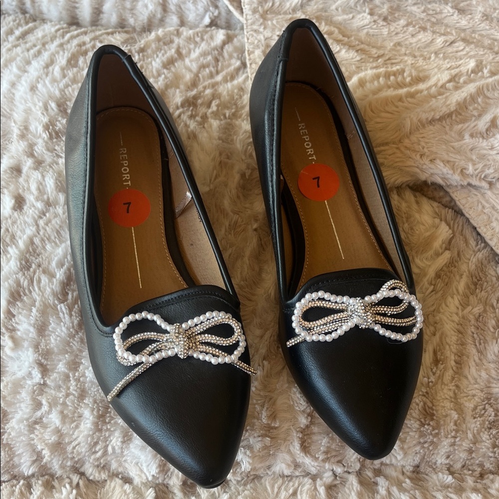 Report Black Flats with Pearl Bow Accent